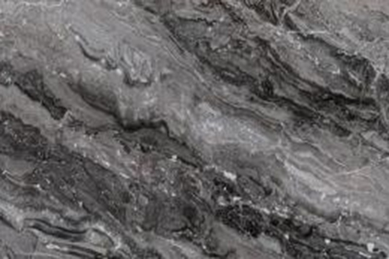 Sofá individual de mármol gris claro con cojín